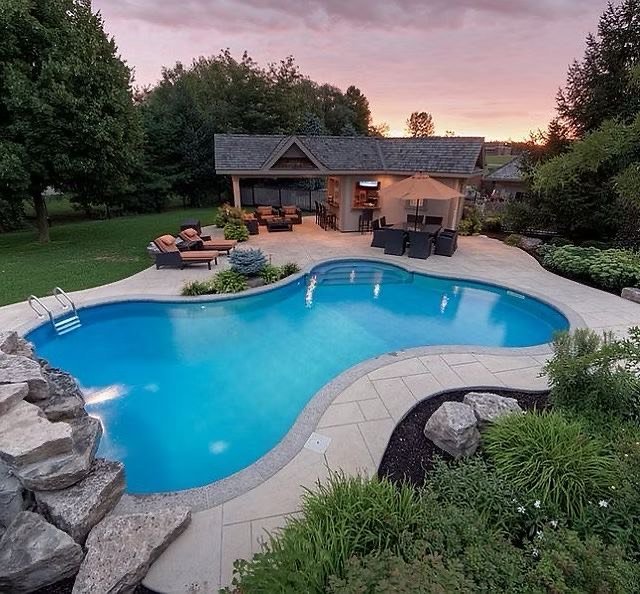 Custom pool decking installation in Newark, DE with modern design and durable finish.